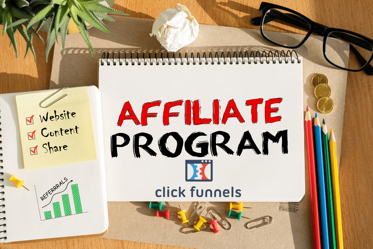 A notepad with ClickFunnels Affiliate Program review written on it